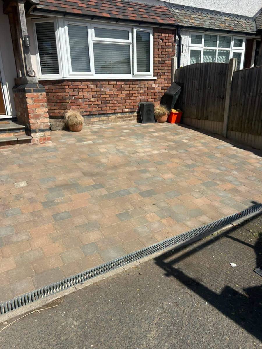 Driveway cleared and swept, builders waste gone